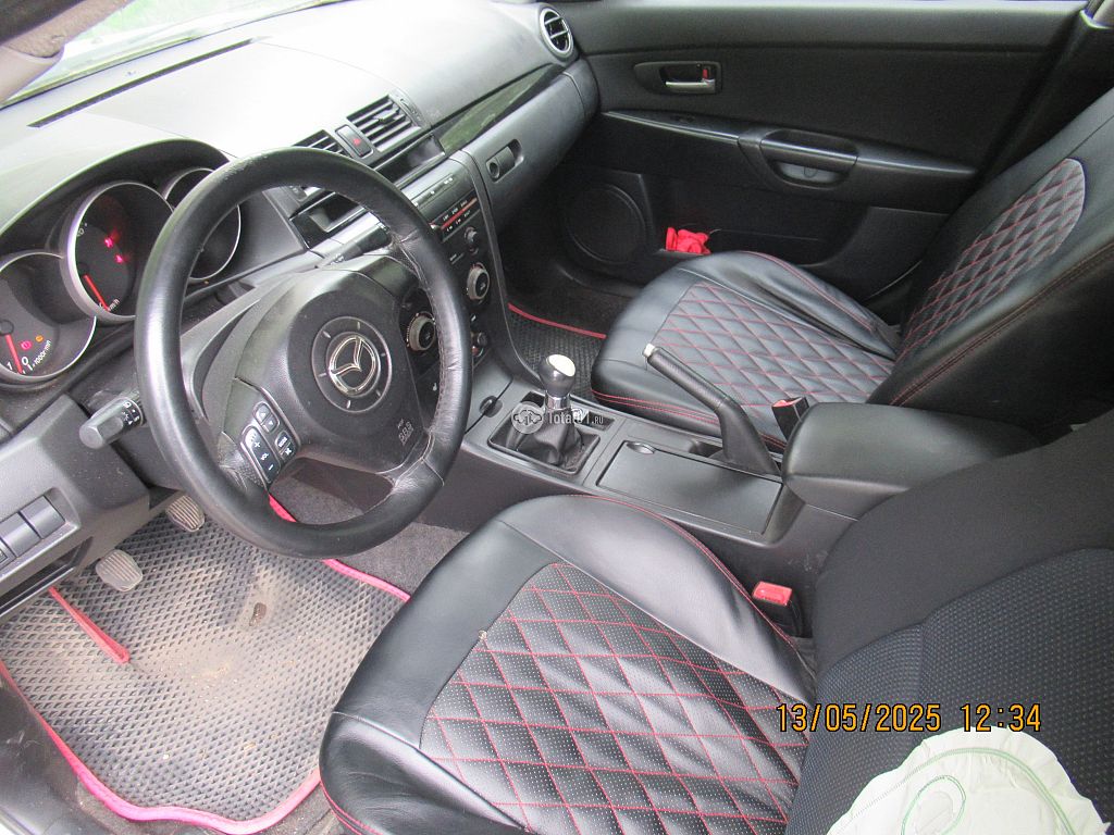Фото Mazda 3 18