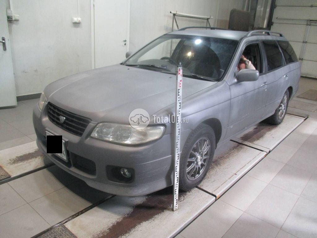 Фото Nissan Avenir 10