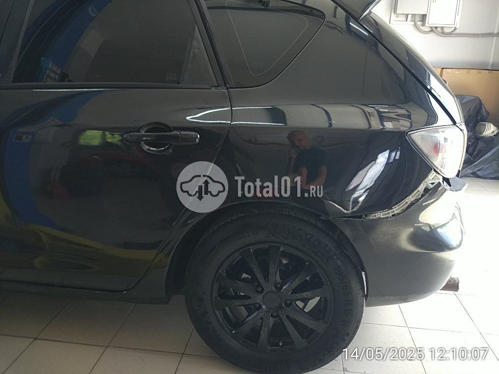 Фото Mazda 3 14