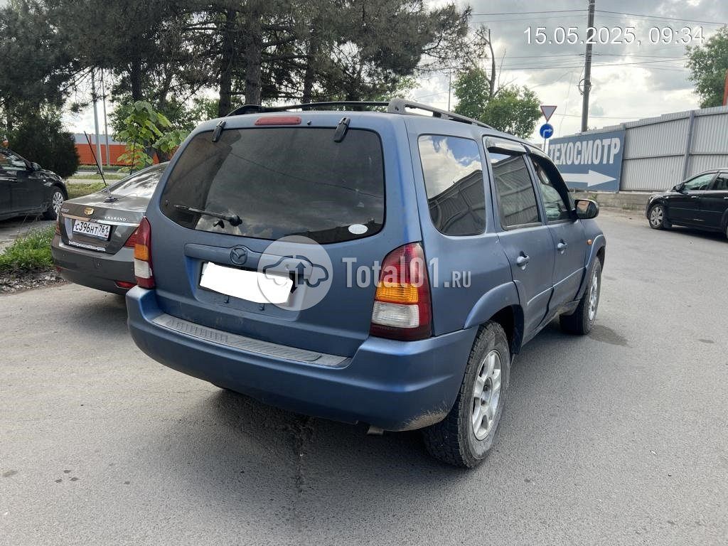 Фото Mazda Tribute 8