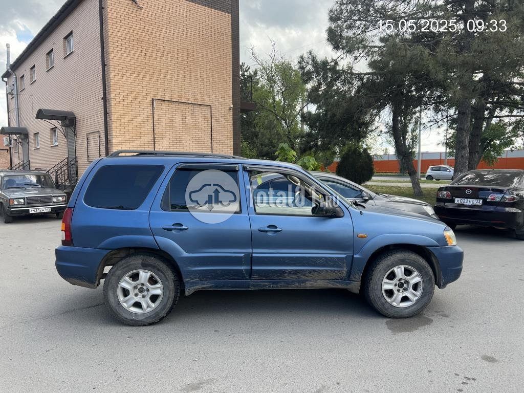 Фото Mazda Tribute 10