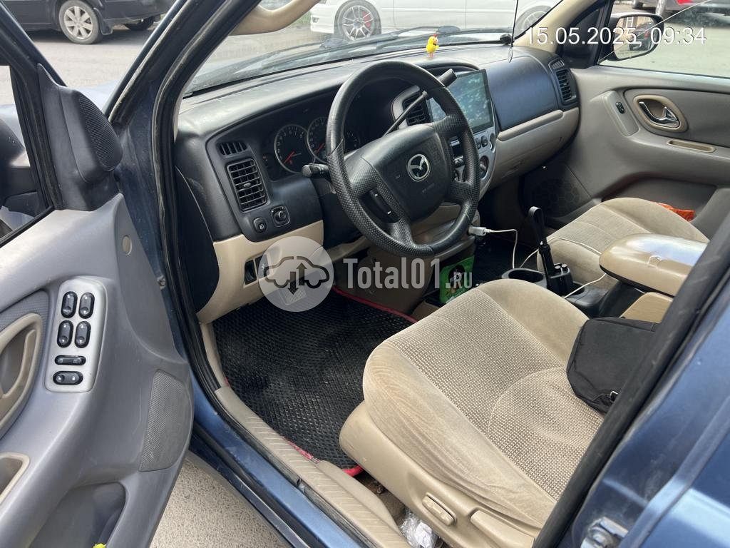 Фото Mazda Tribute 12
