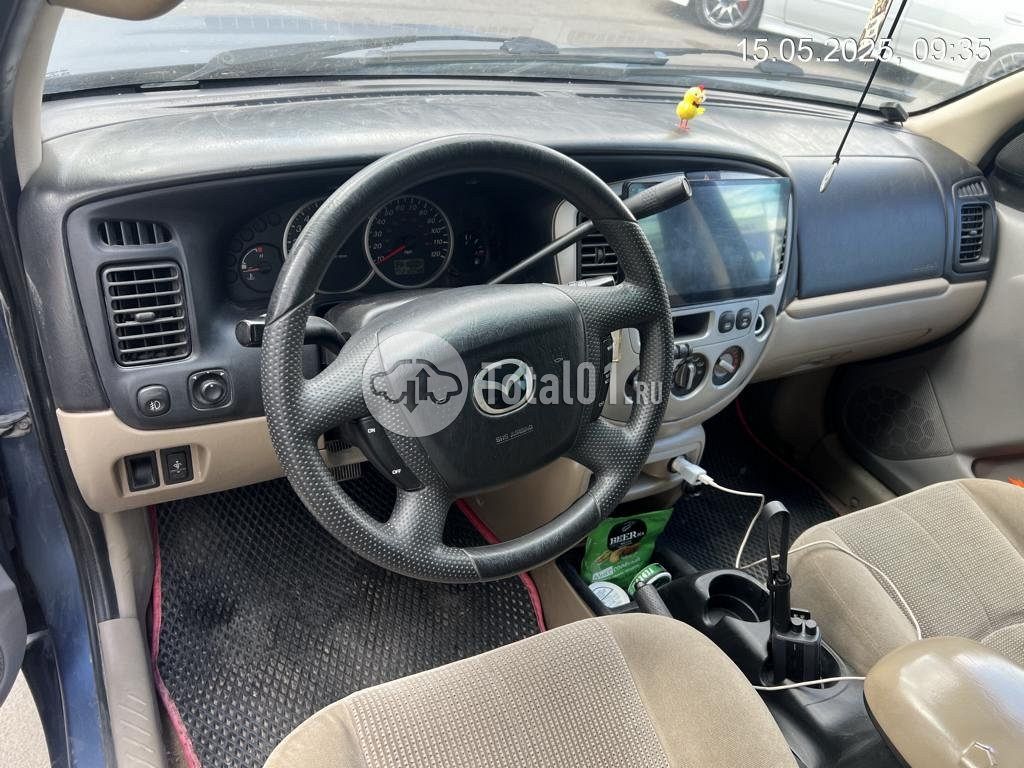 Фото Mazda Tribute 14