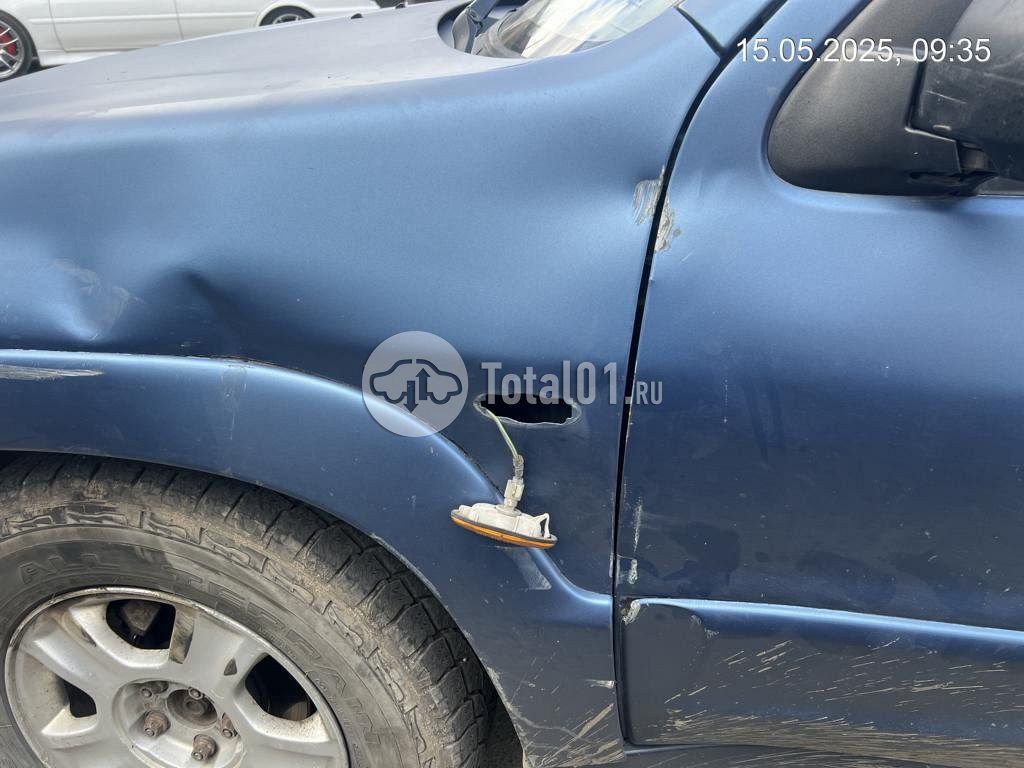 Фото Mazda Tribute 16