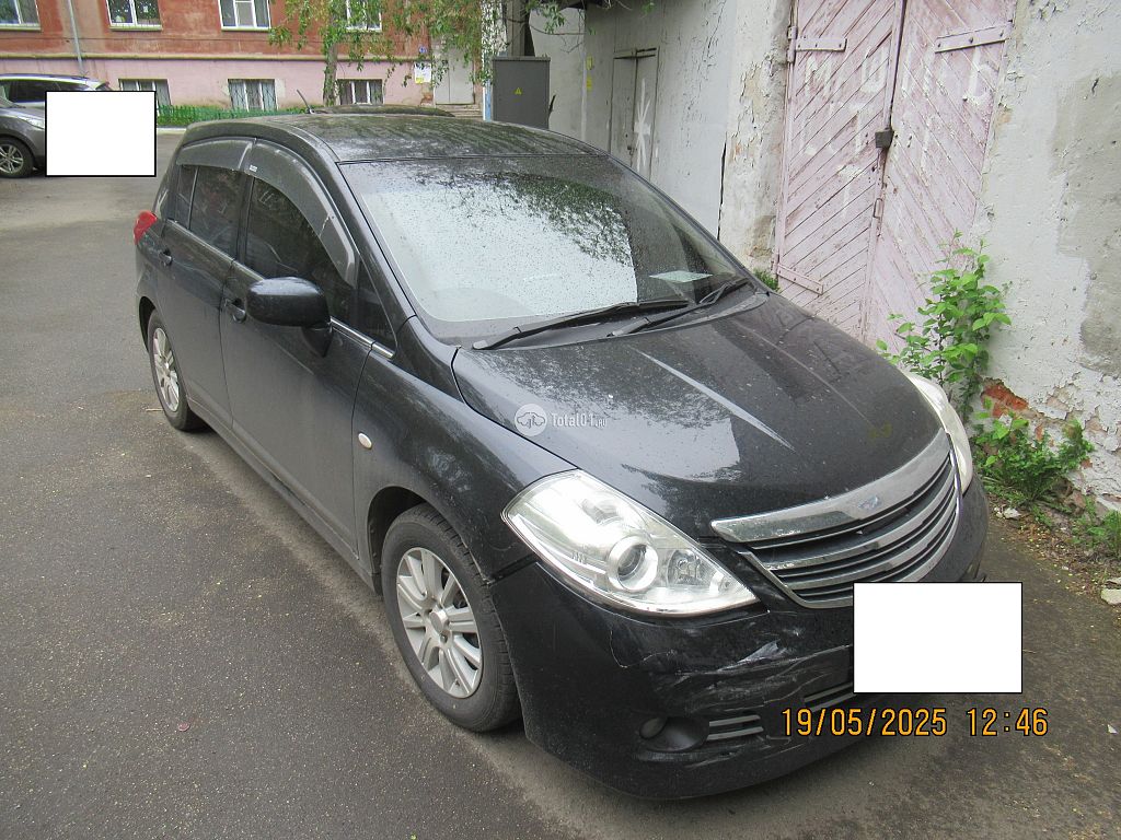 Фото Nissan Tiida 4