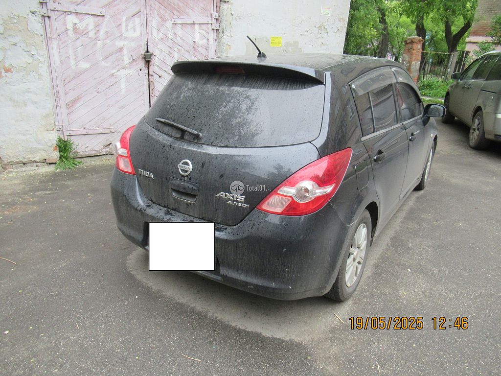 Фото Nissan Tiida 6