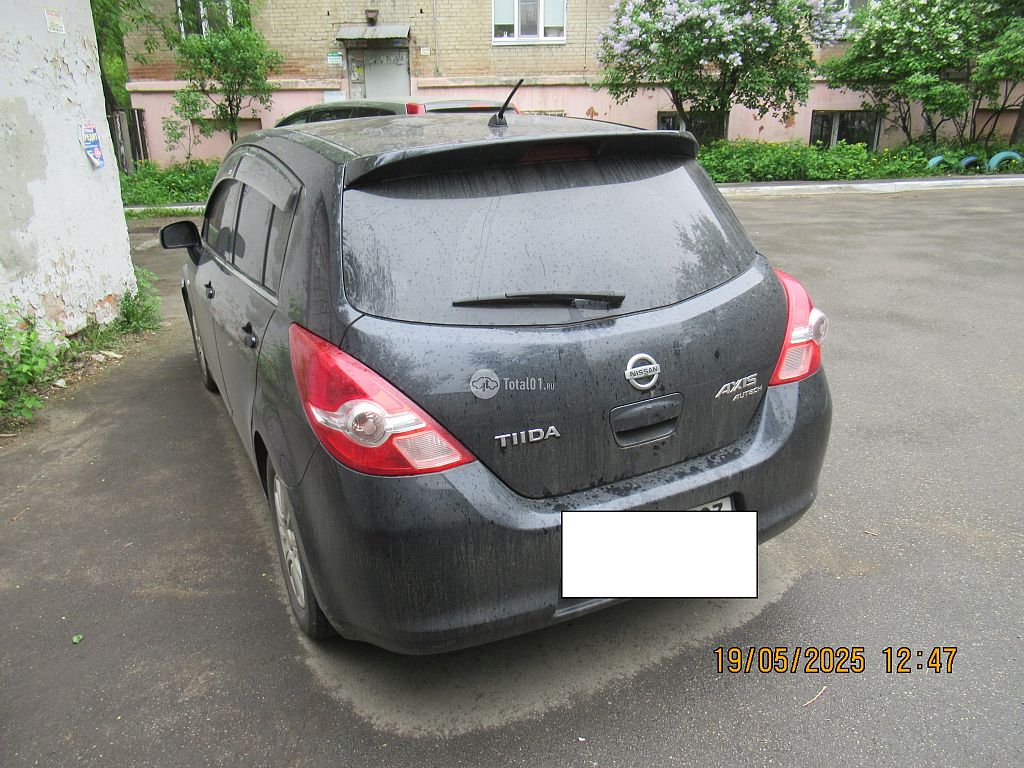 Фото Nissan Tiida 8