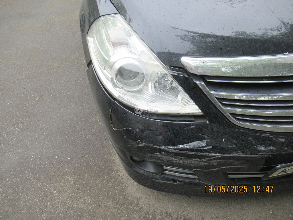 Фото Nissan Tiida 14