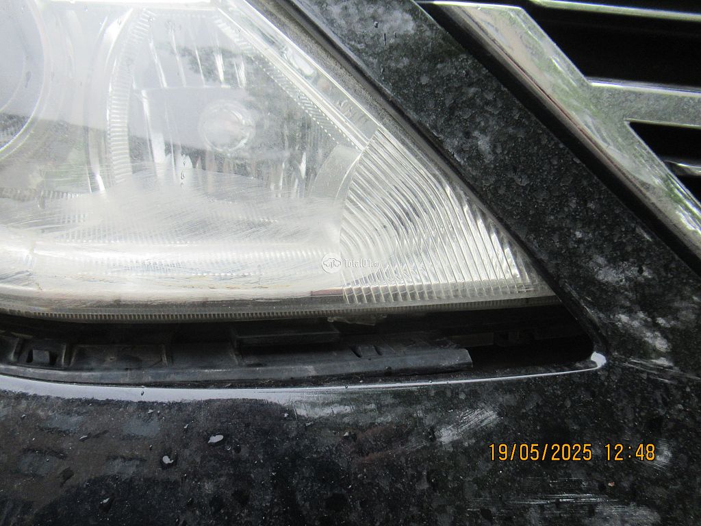 Фото Nissan Tiida 34