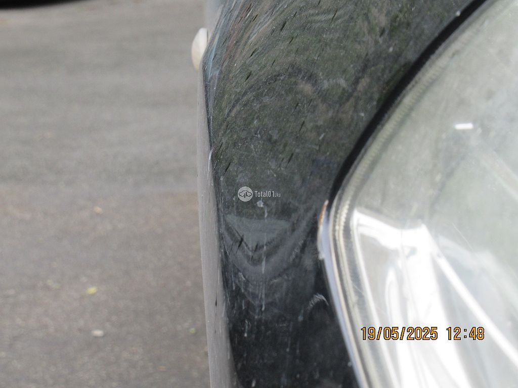 Фото Nissan Tiida 36
