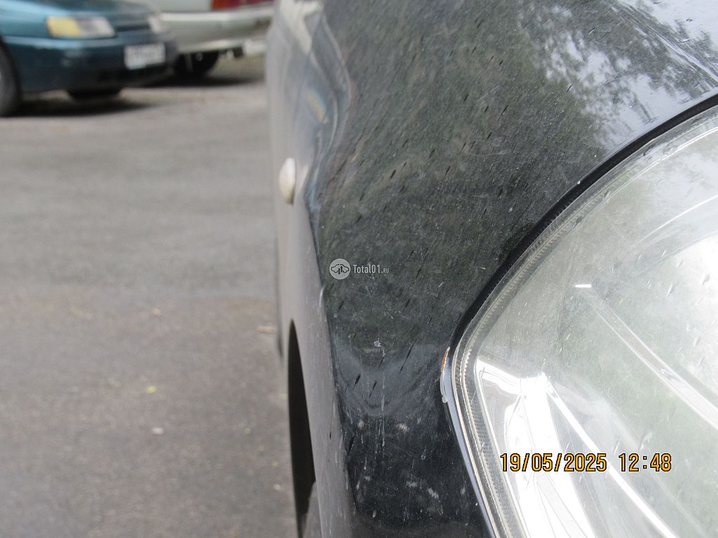 Фото Nissan Tiida 38
