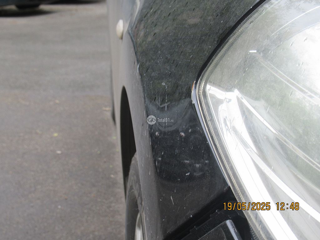Фото Nissan Tiida 42