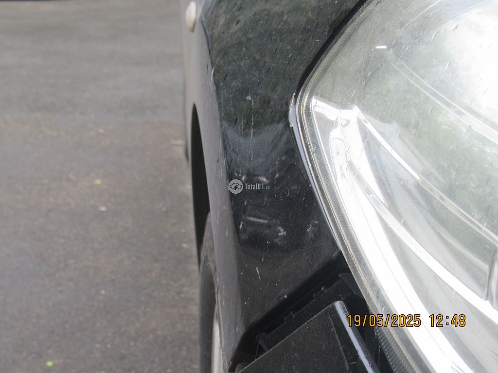 Фото Nissan Tiida 44