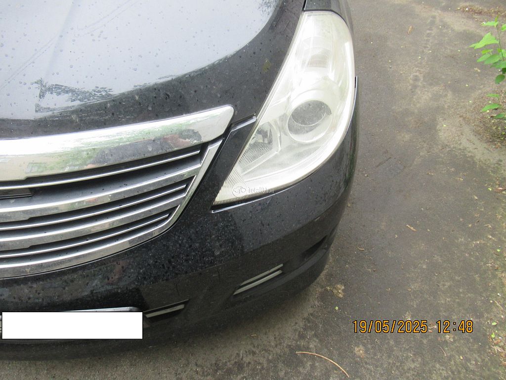 Фото Nissan Tiida 46