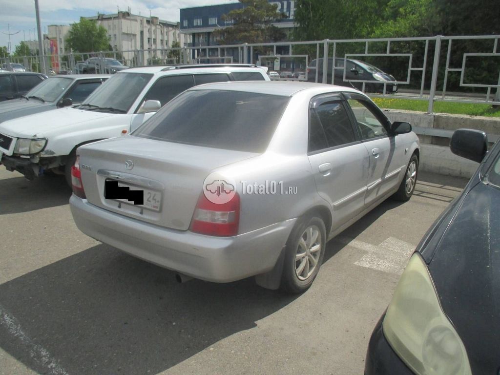 Фото Mazda Familia 14