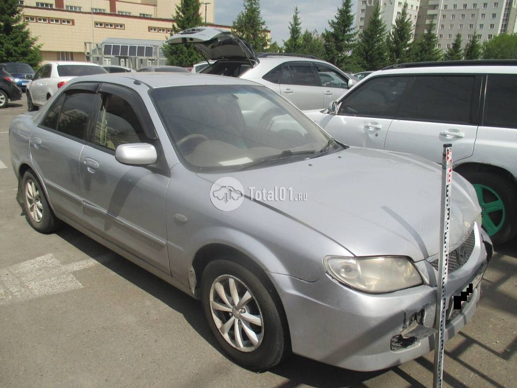Фото Mazda Familia 16