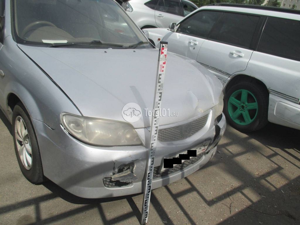 Фото Mazda Familia 18