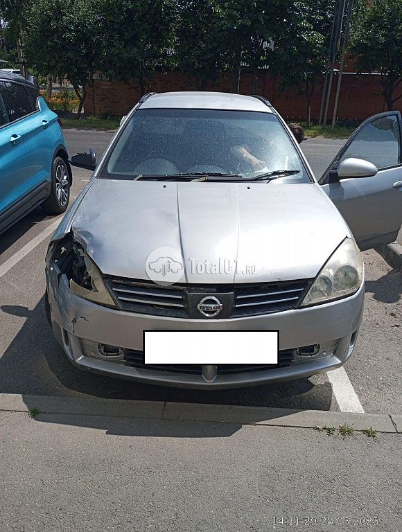 Фото Nissan Wingroad 2