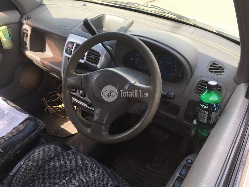 Фото Nissan Cube 14