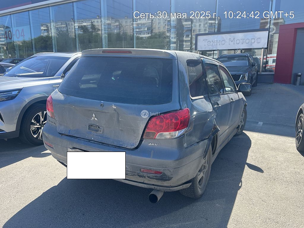 Фото Mitsubishi Airtrek 8