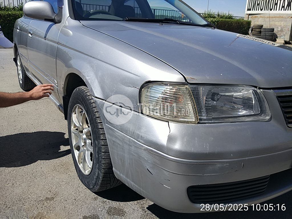 Фото Nissan Sunny 12