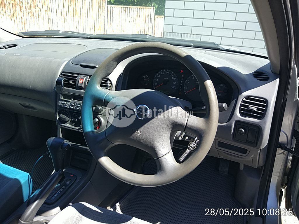 Фото Nissan Sunny 26