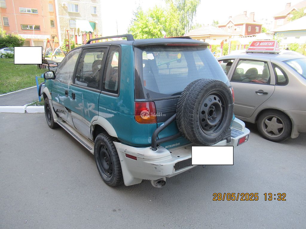Фото Mitsubishi RVR 10