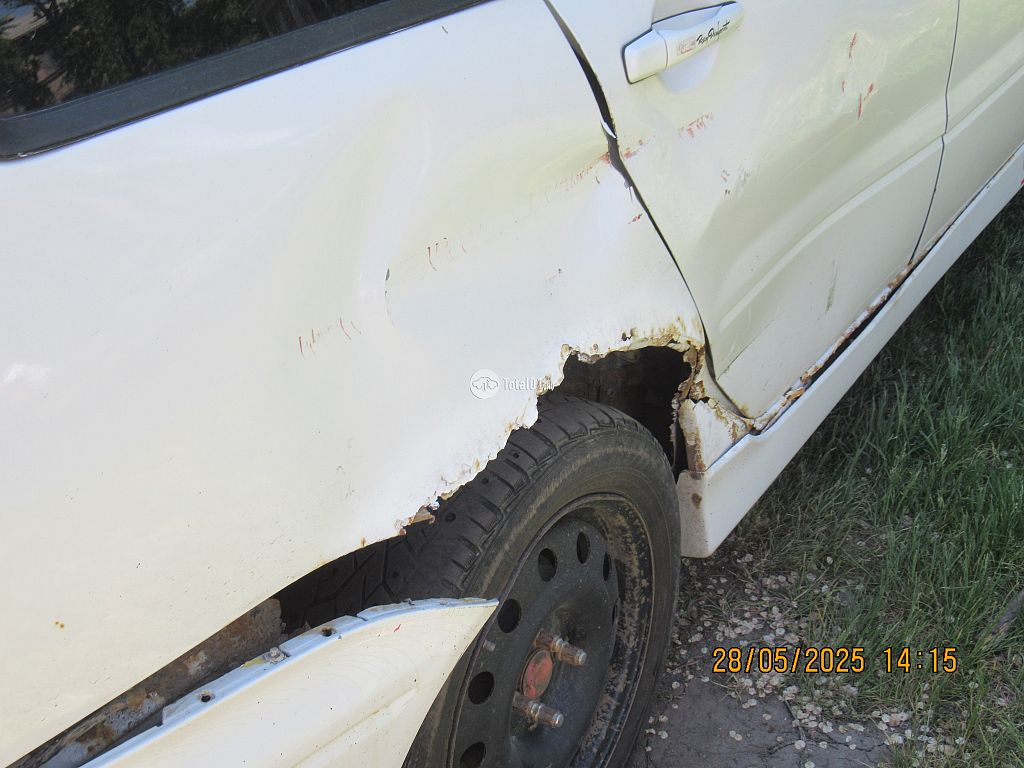 Фото Mitsubishi Lancer Cedia 76