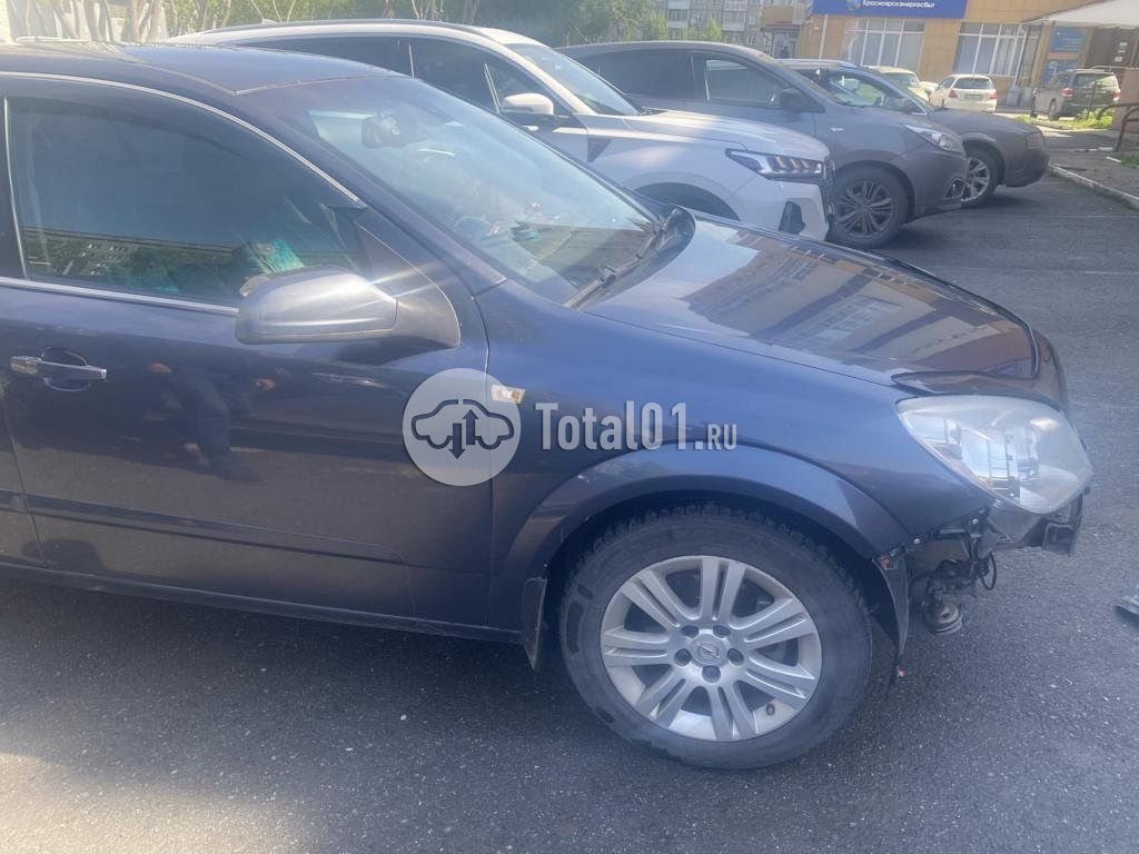 Фото Opel Astra 12