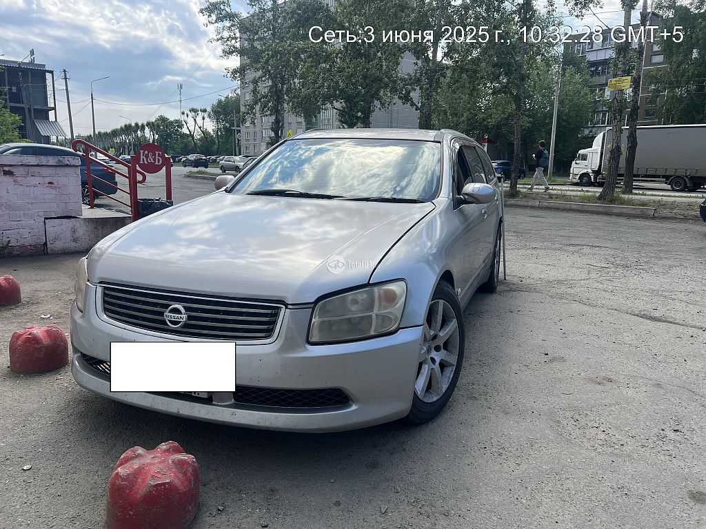 Фото Nissan Stagea 8
