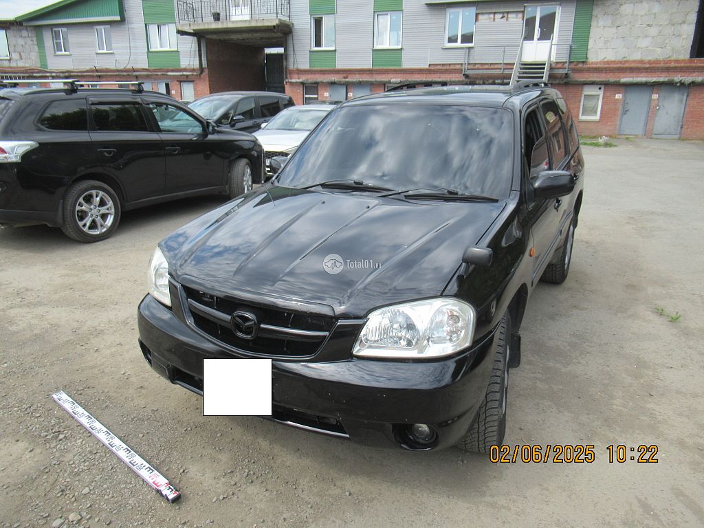 Фото Mazda Tribute 4
