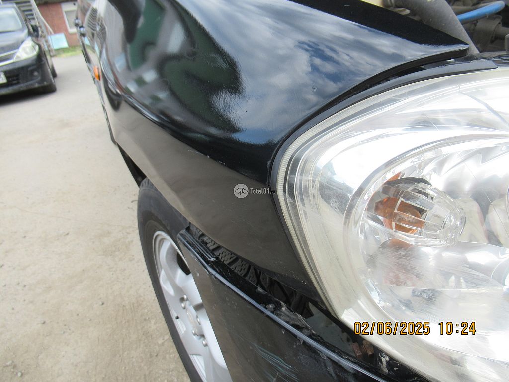 Фото Mazda Tribute 50