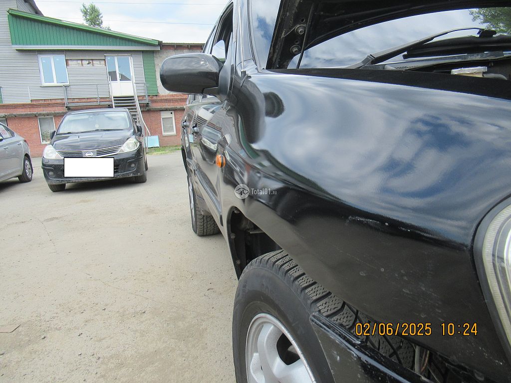 Фото Mazda Tribute 54