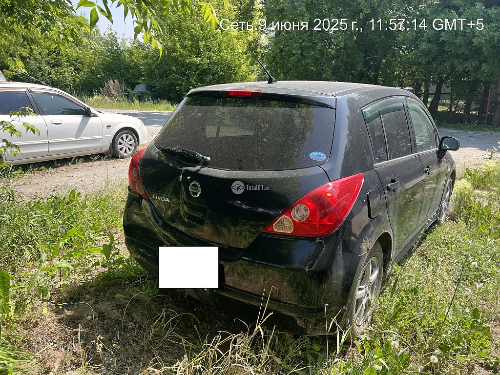 Фото Nissan Tiida 6