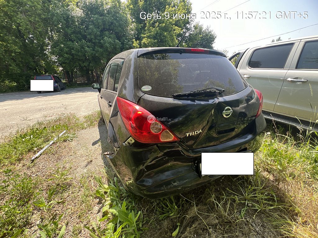Фото Nissan Tiida 8