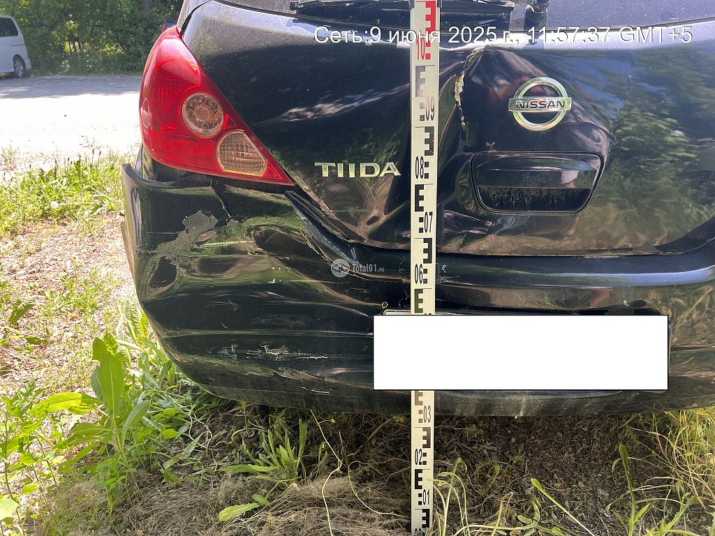 Фото Nissan Tiida 10