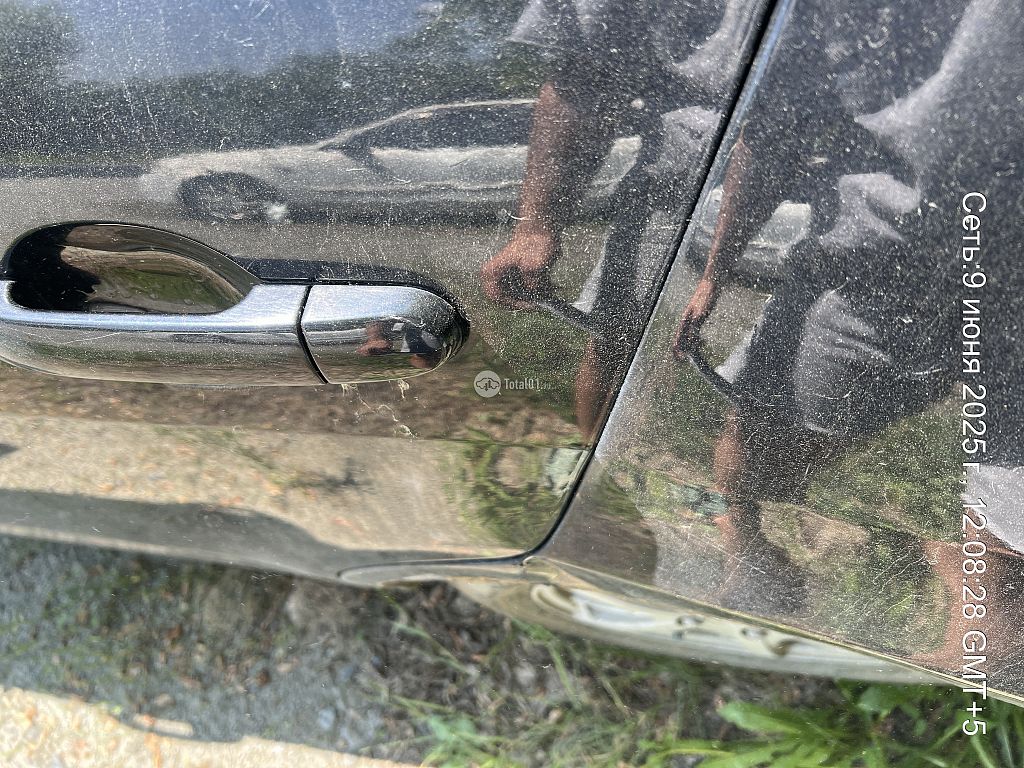 Фото Nissan Tiida 156