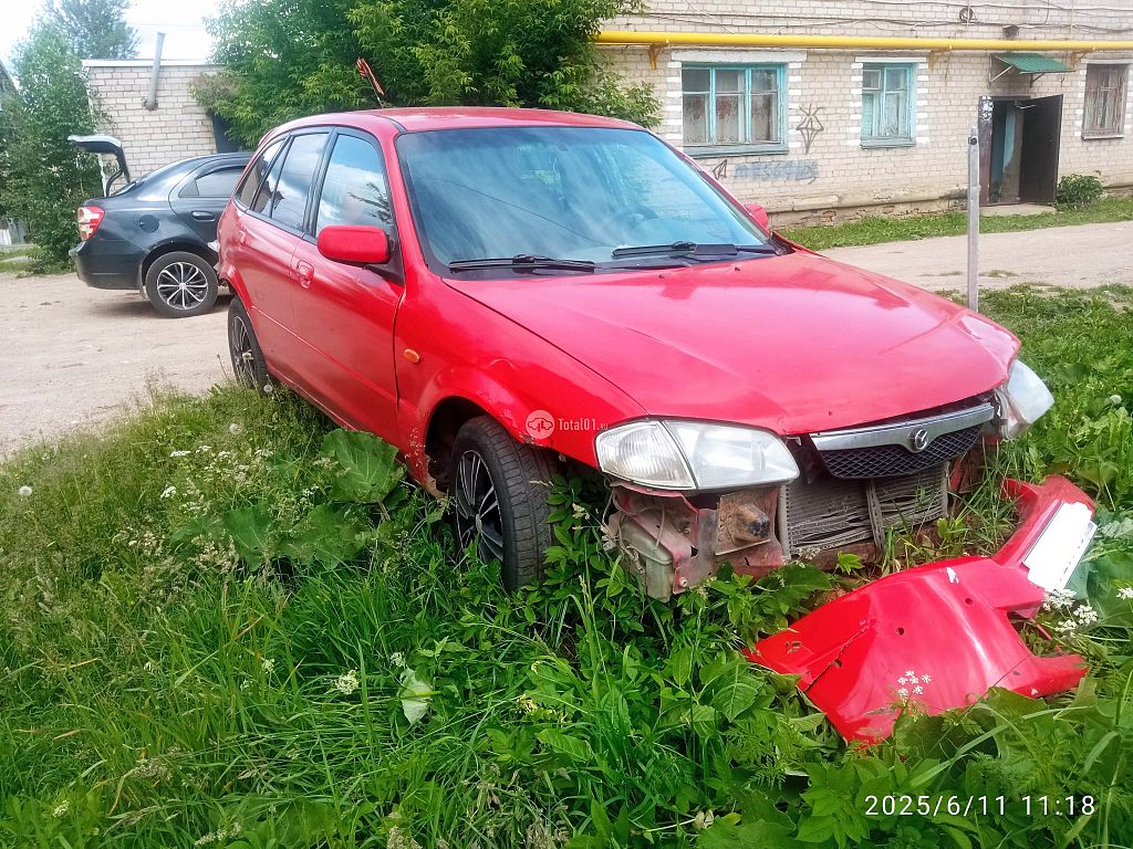 Фото Mazda 323 2