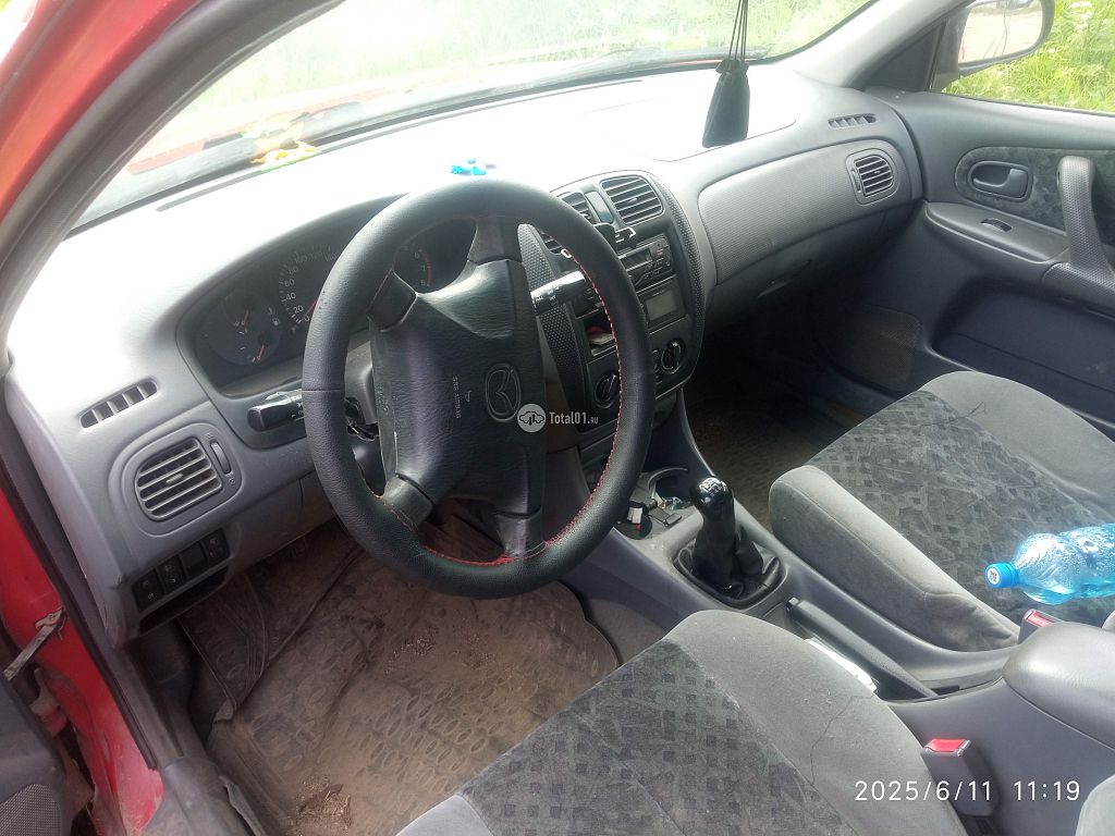 Фото Mazda 323 20
