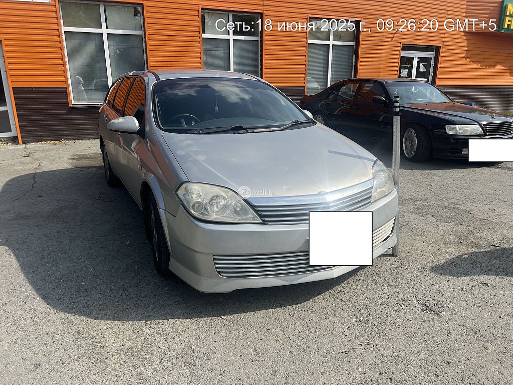 Фото Nissan Primera 4