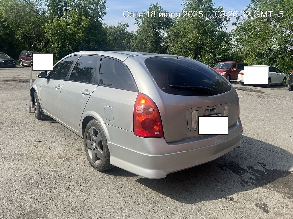 Фото Nissan Primera 6