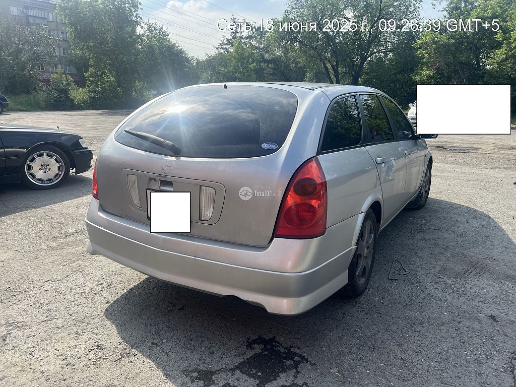 Фото Nissan Primera 8