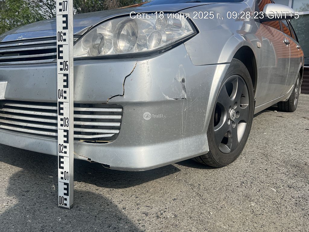 Фото Nissan Primera 10