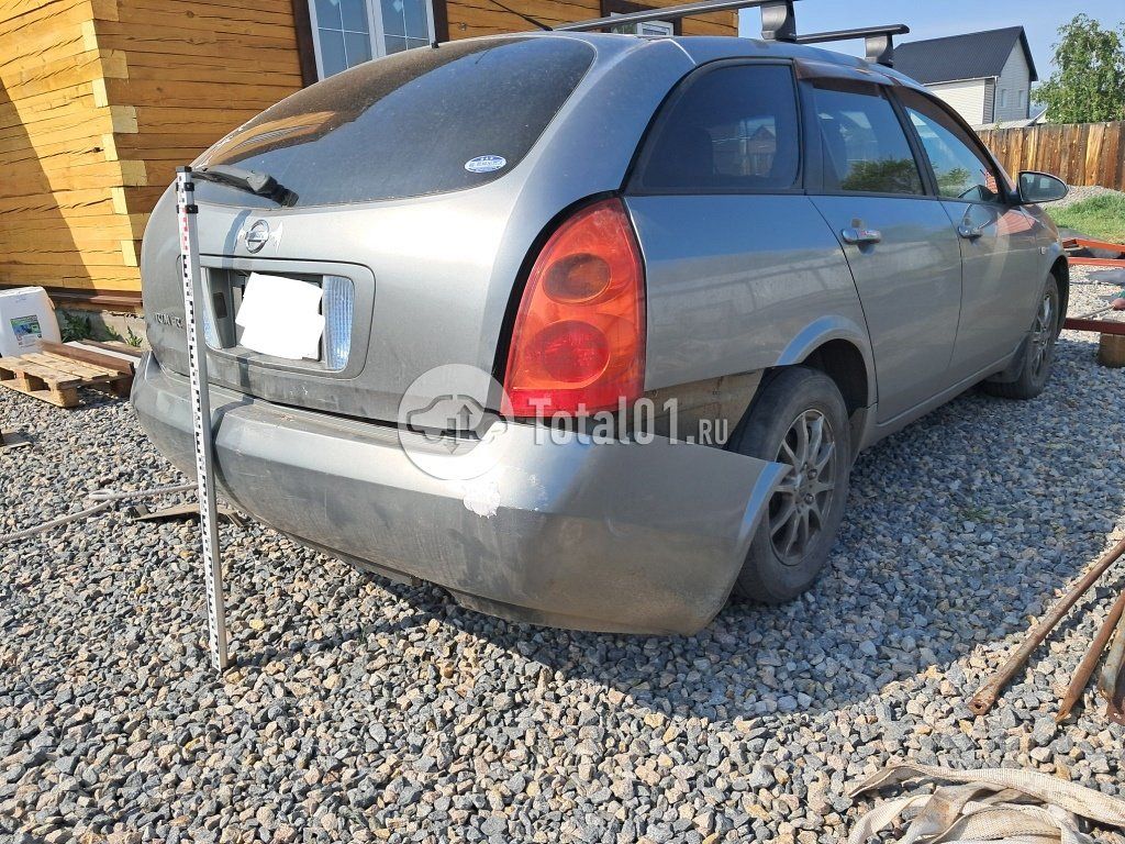 Фото Nissan Primera 8