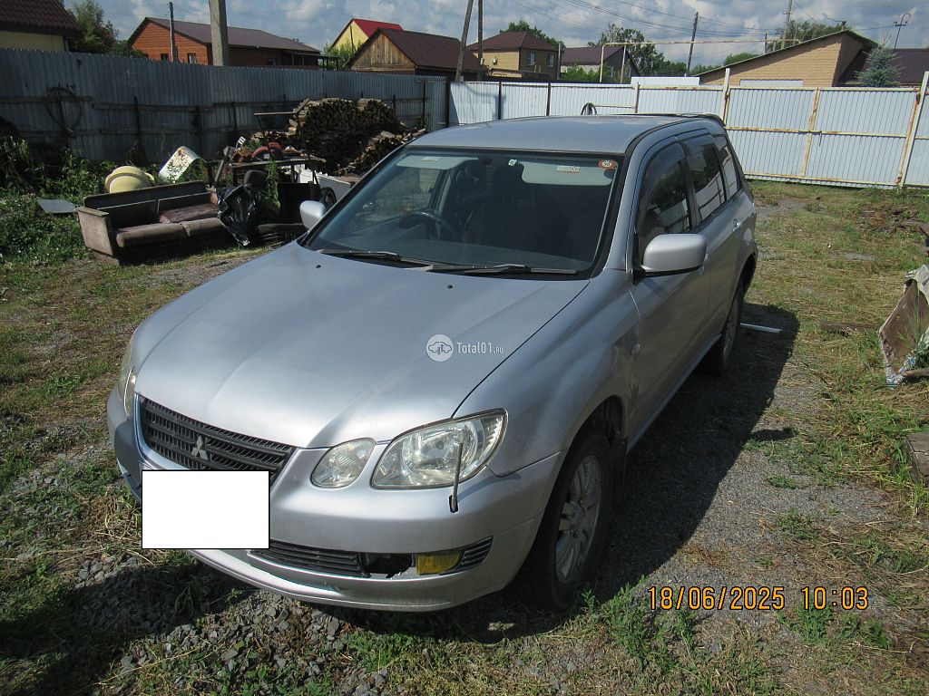 Фото Mitsubishi Airtrek 8