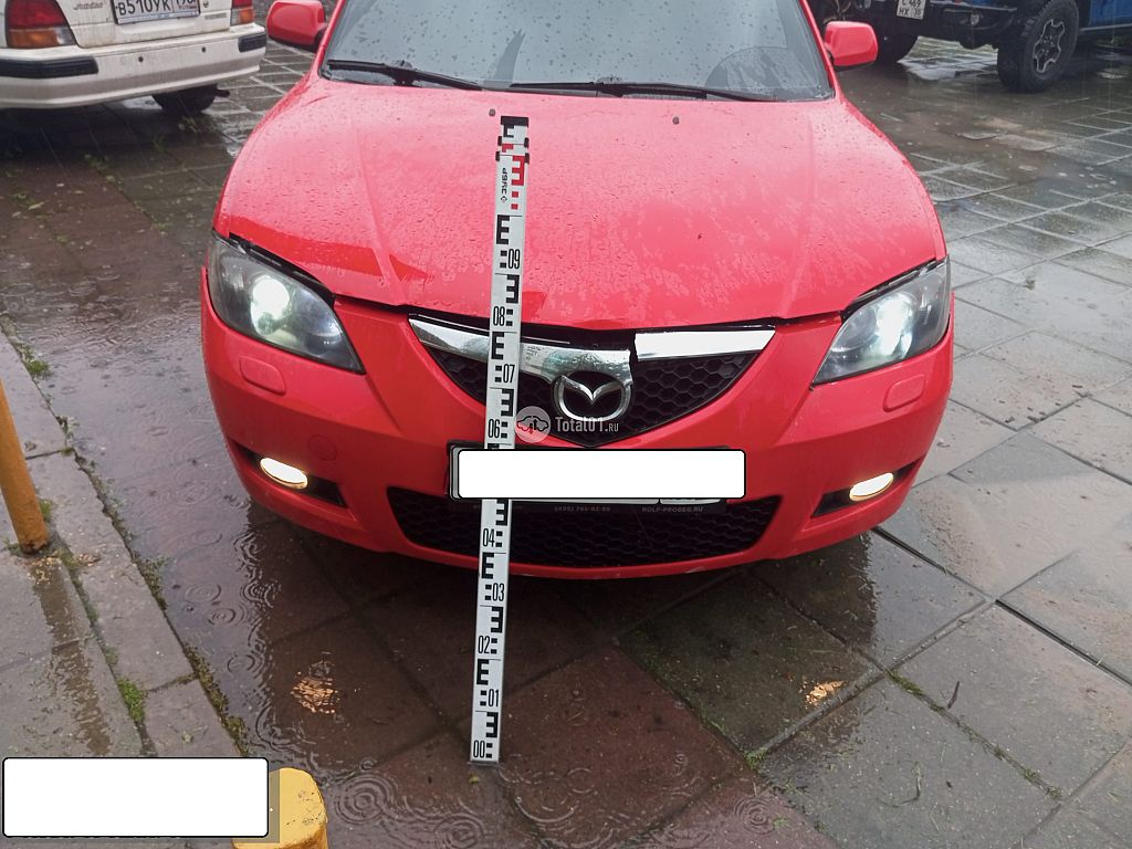 Фото Mazda 3 16