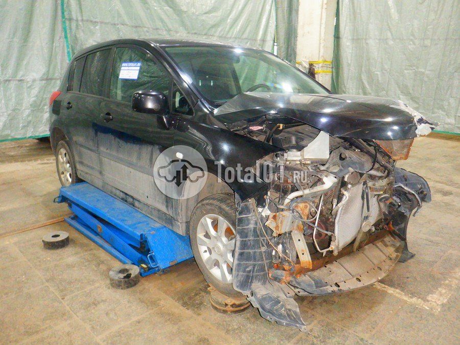 Фото Nissan Tiida 8