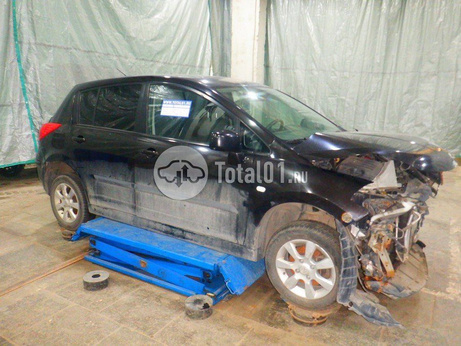 Фото Nissan Tiida 10