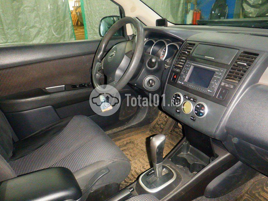 Фото Nissan Tiida 32