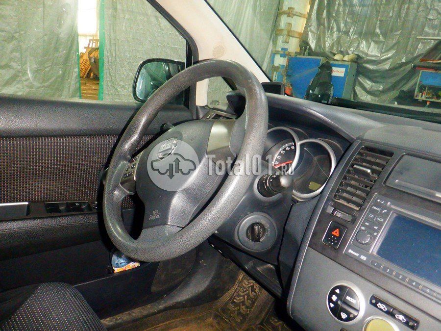 Фото Nissan Tiida 38